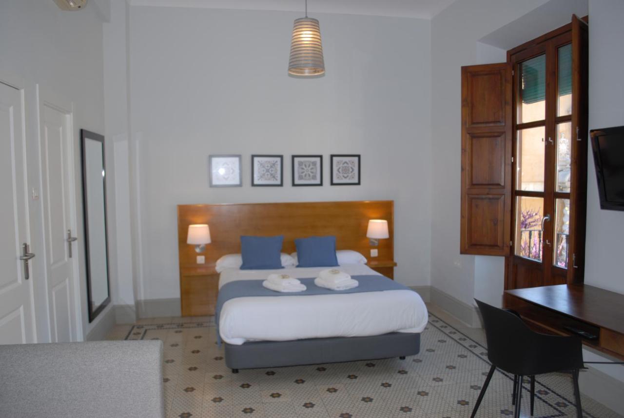 La Perla Granada Suites Bagian luar foto