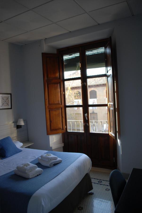 La Perla Granada Suites Bagian luar foto