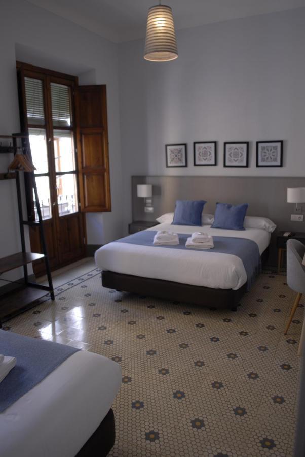 La Perla Granada Suites Bagian luar foto
