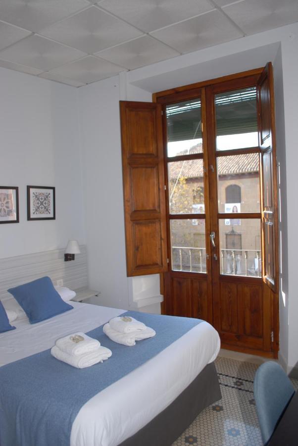 La Perla Granada Suites Bagian luar foto